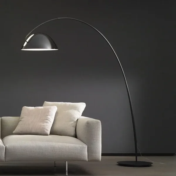 overhead Floor lamp with long bent stand black with white couch
